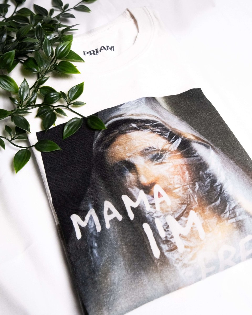 MAMA I’M FREE spiritual freedom graphic tee featuring a praying nun with "MAMA I’M FREE" painted in white, symbolizing liberation
