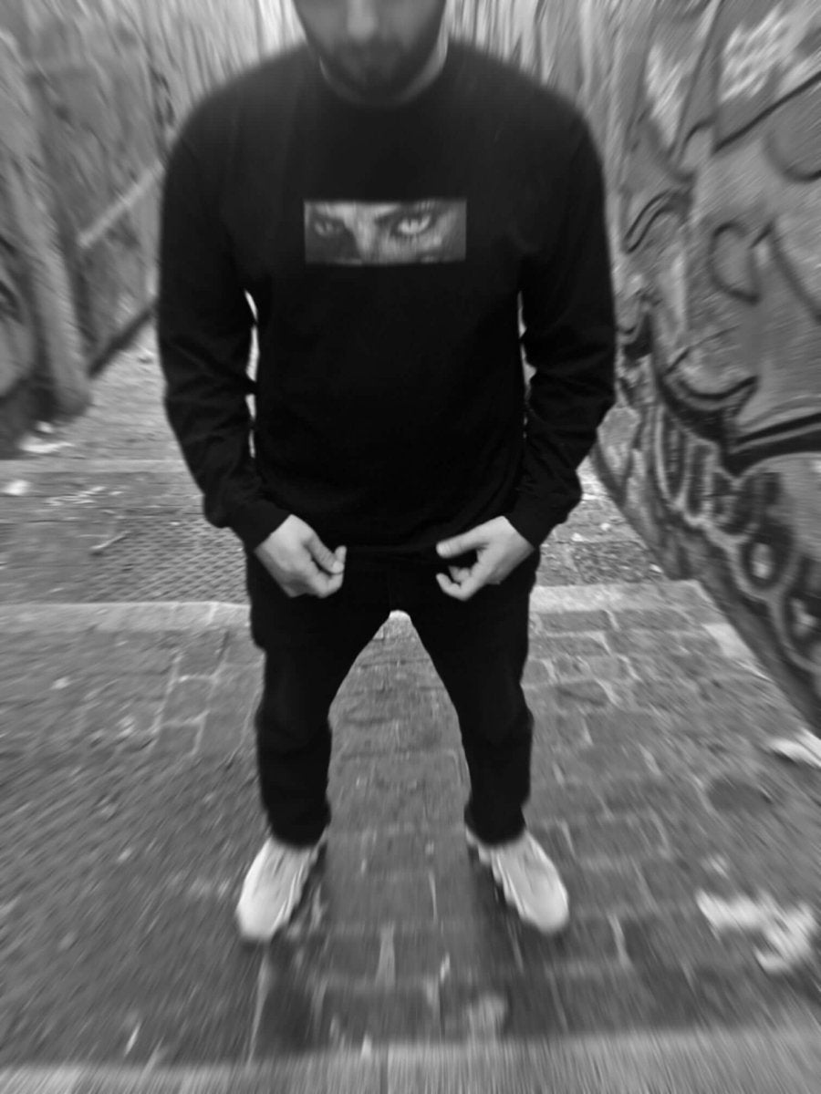 PARANOID Longsleeve T-Shirt with eye graphics on chest and sleeves, bold streetwear design symbolizing awareness and vigilance
