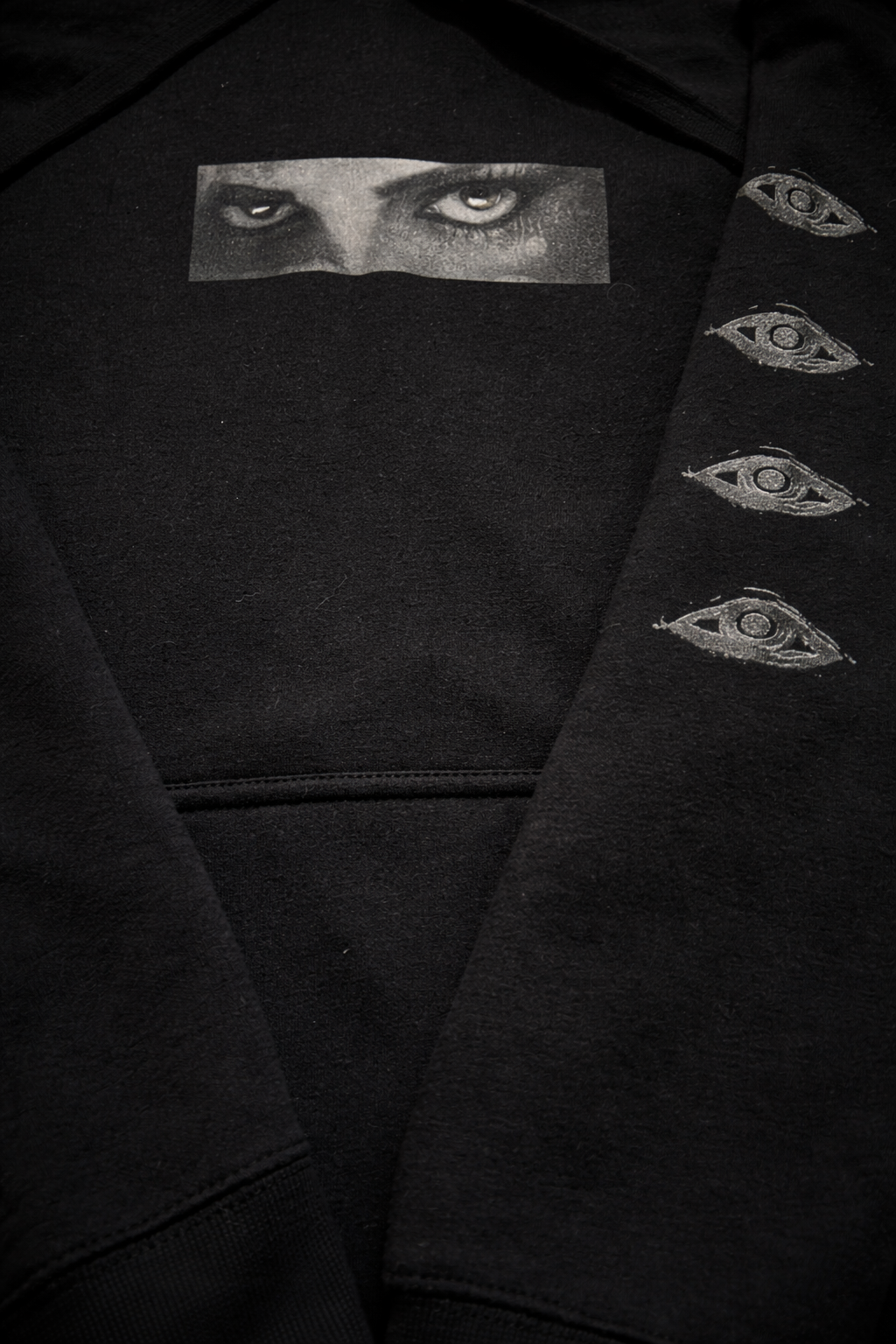 PARANOID black hoodie with eye graphic symbolizing paranoia