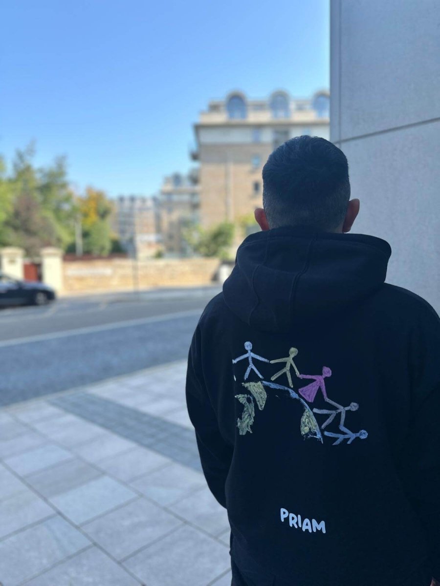 BE HUMAN hoodie representing unity and human imperfection