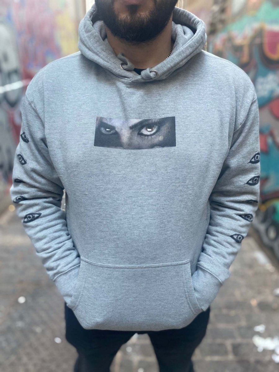 PARANOID Hoodie Streetwear with Eye Graphics on Chest & Sleeves worn by model